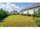 Expansive backyard with lush lawn, trimmed bushes, and views of neighboring homes at 333 Dudley Dr, Fort Mill, SC 29715