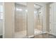 Modern bathroom with two tiled walk-in showers and glass doors at 333 Dudley Dr, Fort Mill, SC 29715