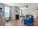 Bright living room with fireplace, hardwood floors, and stylish furniture at 333 Dudley Dr, Fort Mill, SC 29715
