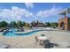 Community pool area with seating, splash pad, and connection to the community building at 333 Dudley Dr, Fort Mill, SC 29715