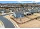 Aerial view of a fenced backyard with a patio, playhouse, and well-maintained lawn at 3439 Duchess Ave, Fort Mill, SC 29707