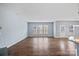 Spacious living room with hardwood floors and several windows, offering ample natural light at 3439 Duchess Ave, Fort Mill, SC 29707