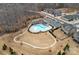 Aerial view of the neighborhood pool and recreational area with lush landscaping at 3439 Duchess Ave, Fort Mill, SC 29707