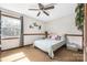 Bright bedroom featuring carpeted floors, natural light, and a ceiling fan at 360 Patience Dr, Concord, NC 28025