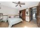 Cozy bedroom with carpeted floors, a ceiling fan and closet at 360 Patience Dr, Concord, NC 28025