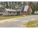 Exterior of the home, showing the large backyard and brick accents on the home at 360 Patience Dr, Concord, NC 28025