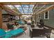 A patio and wooden pergola featuring an outdoor living space with comfortable seating and a fire pit at 360 Patience Dr, Concord, NC 28025