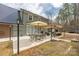 Outdoor patio featuring dining table, umbrella and outdoor seating area with pergola at 360 Patience Dr, Concord, NC 28025