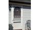 A close-up of a charming back door with intricate detailing and a vintage aesthetic, adding character to the home at 376 Brookgreen Nw Pl, Concord, NC 28027