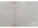 Walk-in closet with wire shelving for organized storage solutions at 439 Newfound Hollow Dr, Charlotte, NC 28214