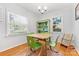 Cozy dining area with hardwood floors and lots of light at 4635 General Pershing Dr, Charlotte, NC 28209