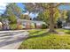 Large front yard with driveway leading to this cozy one story home at 4635 General Pershing Dr, Charlotte, NC 28209