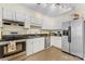 Features stainless steel appliances, white cabinets, and granite countertops at 4635 General Pershing Dr, Charlotte, NC 28209