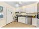 Features stainless steel appliances, white cabinets, and granite countertops at 4635 General Pershing Dr, Charlotte, NC 28209