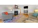 Spacious living room with hardwood floors, fireplace and comfortable seating at 4635 General Pershing Dr, Charlotte, NC 28209