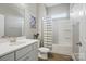 Bathroom featuring tile flooring, a shower-tub combination, and a vanity with white countertops at 5004 Oakmere Rd, Waxhaw, NC 28173
