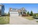 Lovely single-Gathering home with a well-kept lawn and a two car garage, offering suburban living at its finest at 5004 Oakmere Rd, Waxhaw, NC 28173