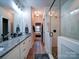 Bathroom with double vanity, granite counters and glass shower enclosure at 508 Summerfield Pl, Belmont, NC 28012