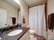 Bathroom with granite countertop and modern fixtures at 508 Summerfield Pl, Belmont, NC 28012