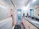 Bathroom with a glass shower, double sinks, and granite countertops at 508 Summerfield Pl, Belmont, NC 28012