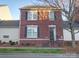 Charming brick two-story home with black shutters and landscaped front yard at 508 Summerfield Pl, Belmont, NC 28012