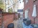 Brick patio with seating and string lights at 508 Summerfield Pl, Belmont, NC 28012