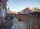 Backyard patio with a grill and seating at 508 Summerfield Pl, Belmont, NC 28012