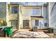 Backyard featuring siding, a sliding glass door, and concrete at 6210 Windsor Gate Ln, Charlotte, NC 28215