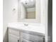 Bright bathroom featuring a large mirror and sleek sink at 6210 Windsor Gate Ln, Charlotte, NC 28215