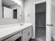 Bathroom featuring an expansive white countertop and modern fixtures at 6210 Windsor Gate Ln, Charlotte, NC 28215
