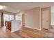 Spacious living room featuring hardwood floors and an open concept floor plan at 623 Olmsted Park Pl # D, Charlotte, NC 28203