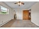 Well-lit bedroom with neutral carpet, window view, and access to an ensuite bathroom at 6285 Nc 16 N Hwy, Taylorsville, NC 28681