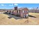 Charming single-story brick home with attached garage and well-maintained yard at 6285 Nc 16 N Hwy, Taylorsville, NC 28681