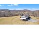 Expansive property with mature trees including two homes and an attached carport at 6285 Nc 16 N Hwy, Taylorsville, NC 28681