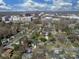 Aerial view of a neighborhood, highlighting residential homes and buildings at 6319 Hazelton Dr, Charlotte, NC 28210