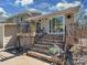Charming home exterior boasting stone stairs, brick accents, and a cozy outdoor seating area at 6319 Hazelton Dr, Charlotte, NC 28210