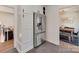 Modern kitchen with stainless steel refrigerator and convenient access to the dining area and living space at 6319 Hazelton Dr, Charlotte, NC 28210