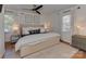 Bright main bedroom with hardwood floors and neutral decor at 6319 Hazelton Dr, Charlotte, NC 28210