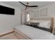 Serene main bedroom with soft lighting and ceiling fan at 6319 Hazelton Dr, Charlotte, NC 28210