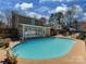 Beautiful backyard featuring a large in-ground pool and inviting patio space for outdoor relaxation and entertainment at 6319 Hazelton Dr, Charlotte, NC 28210