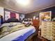 Packed bedroom scene with mixed decor and furniture arrangement at 701 N Scruggs St, Gastonia, NC 28052