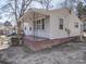 Cozy one-story house with a covered front porch, showcasing a simple design at 701 N Scruggs St, Gastonia, NC 28052
