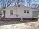 Backyard exterior view of house with two windows at 701 N Scruggs St, Gastonia, NC 28052