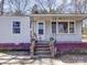Charming front porch entrance with covered entryway to the home at 701 N Scruggs St, Gastonia, NC 28052