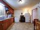 Functional kitchen featuring ample cabinet space, appliances, and a connecting dining area at 701 N Scruggs St, Gastonia, NC 28052