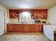 Functional kitchen featuring lots of cabinet space, sink, and a countertop for meal preparation at 701 N Scruggs St, Gastonia, NC 28052