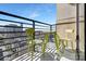 Cozy balcony with seating, views of city skyline and buildings, perfect for relaxing outdoors at 715 N Church St, Charlotte, NC 28202