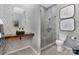 Contemporary bathroom with stylish tiling, a glass shower, and modern fixtures at 715 N Church St, Charlotte, NC 28202