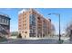 Modern brick building featuring expansive glass windows and multiple levels with balconies at 715 N Church St, Charlotte, NC 28202