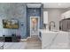 Open-concept kitchen featuring modern countertops, stainless steel appliances, and eat-in island at 715 N Church St, Charlotte, NC 28202